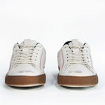 Men's ORIGINAL LC06 Low-top in Retro White Leather, displays the red stitiching and patchwork logo, emphasising craftsmanship.