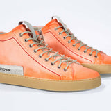 Men's ORIGINAL LC17 High-top Handpainted Orange Canvas offers a sleek and breathable style, perfect for long warm days.