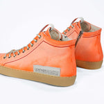 Men's ORIGINAL LC17 High-top Handpainted Orange Canvas offers a casual street-style, shown from the back.