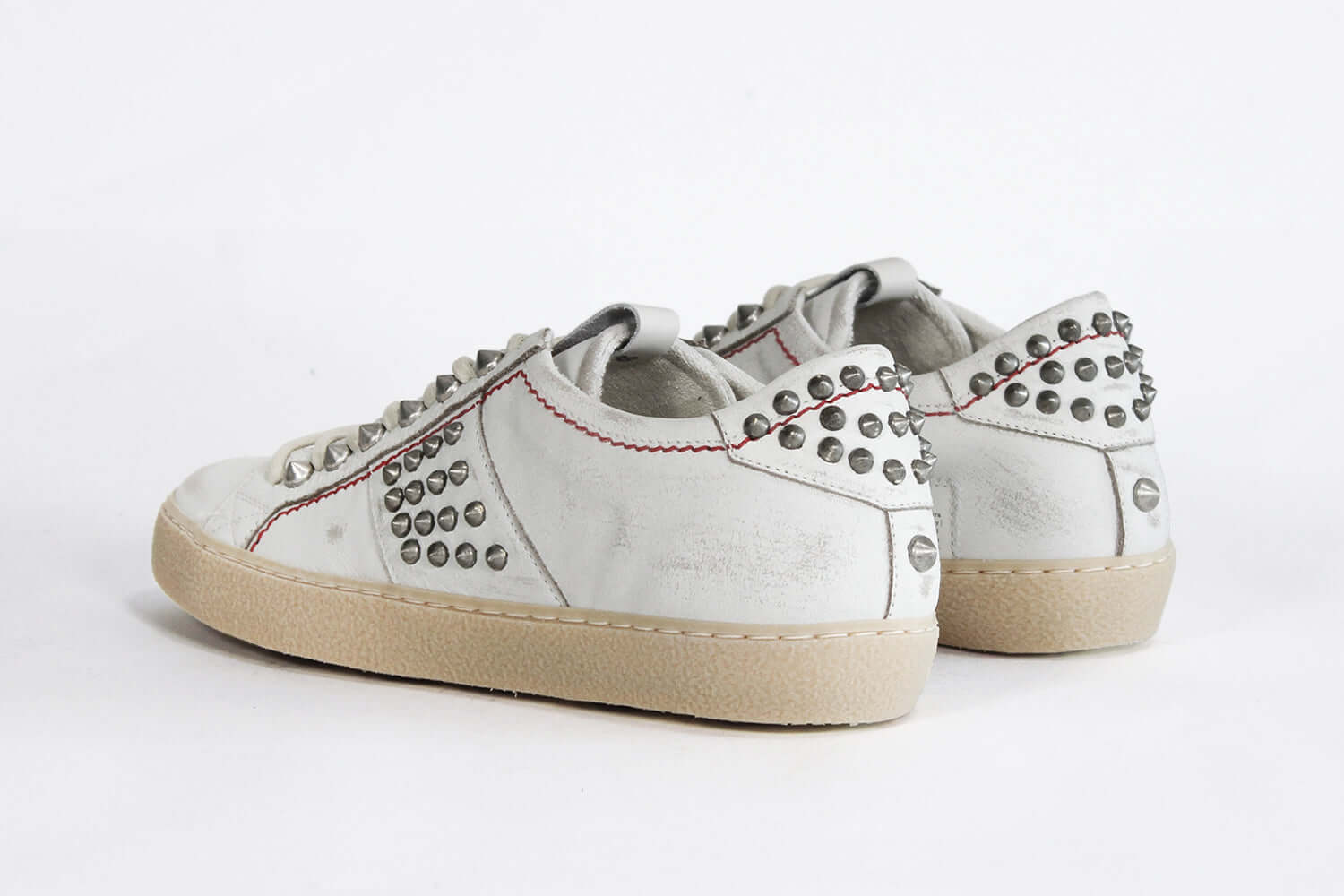 Women's ORIGINAL STUDLIGHT Low-top White Leather & Studs for a rock n' roll look, shown for the back.