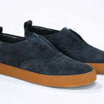 Men's SLIP ON Moccasin Sneaker in Navy Suede with a honey coloured rubber sole and subtle Crown logo.