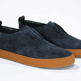 Men's SLIP ON Moccasin Sneaker in Navy Suede with a honey coloured rubber sole and subtle Crown logo.