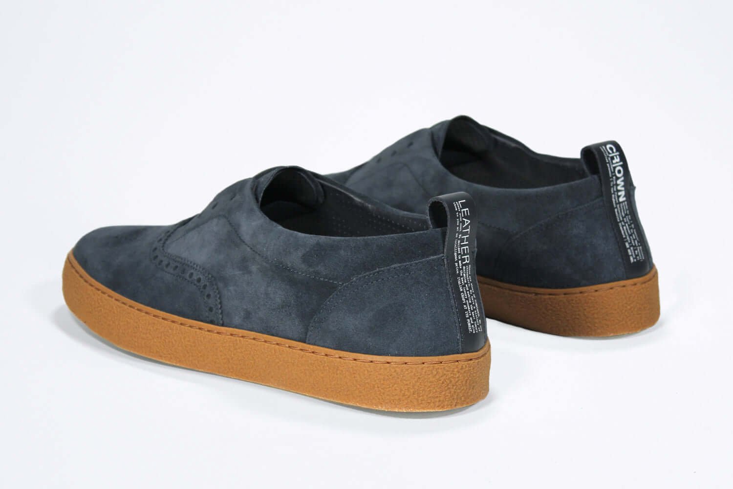 Men's SLIP ON Moccasin Sneaker in Navy Suede for men shown from the back. Offering a casual style for men.