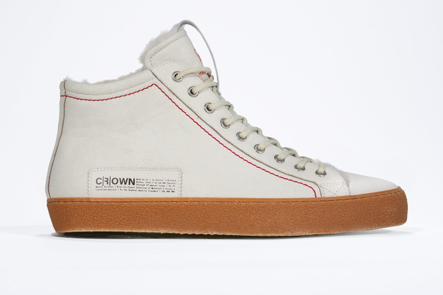Women's ORIGINAL LC17 Fur-lined High-top in White Leather sneaker displays the red stitiching and patchwork logo, shown from the side profile.