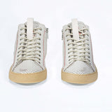 Women's ORIGINAL LC17 High-top Perforated Aged-White Leather sneaker with signature red stitching and a dark natural rubber sole.