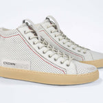  Women's ORIGINAL LC17 High-top Perforated Aged-White Leather sneaker with signature red stitching and a dark natural rubber sole.