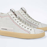  Women's ORIGINAL LC17 High-top Perforated Aged-White Leather sneaker with signature red stitching and a dark natural rubber sole.
