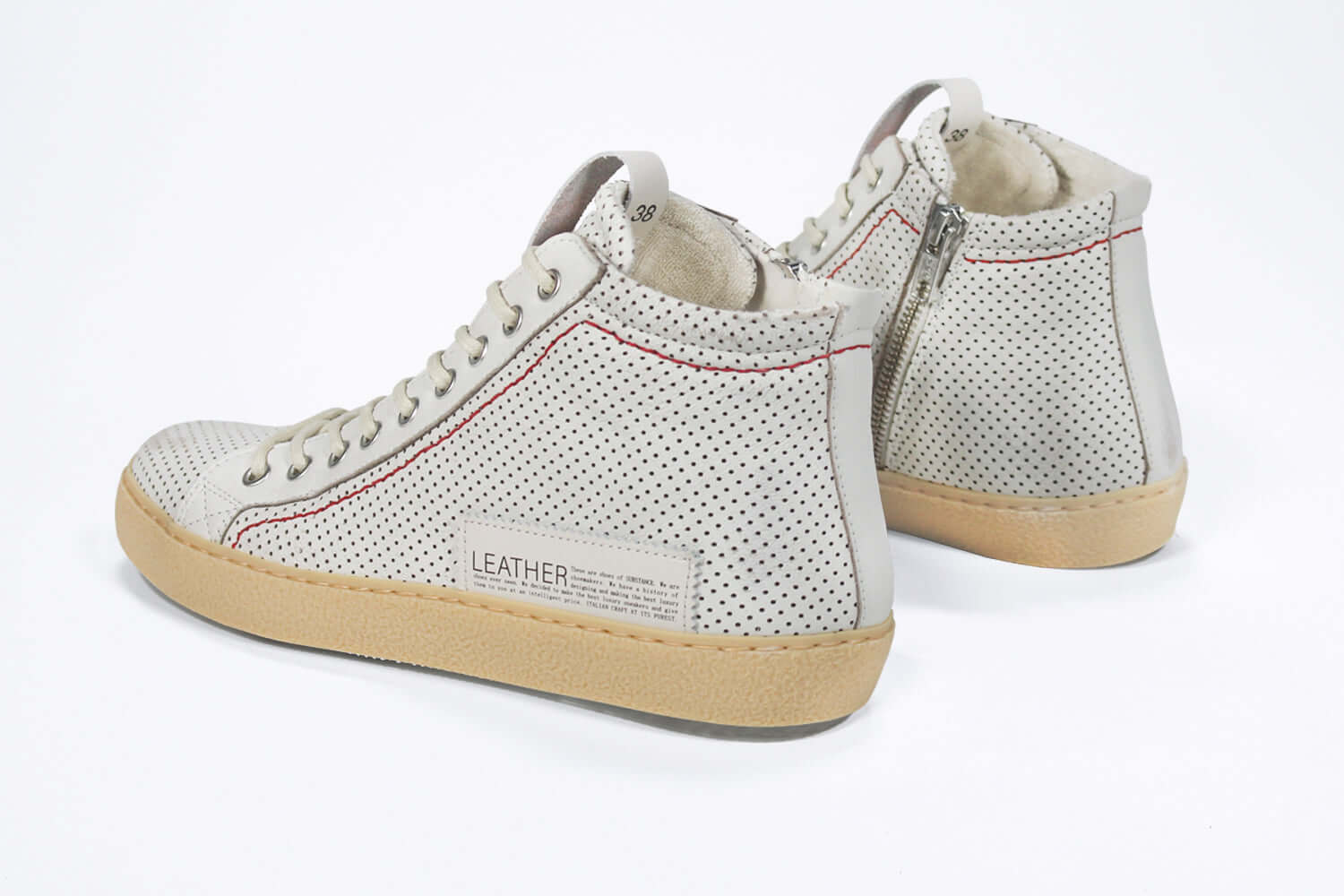 Women's ORIGINAL LC17 High-top Perforated Aged-White Leather sneaker with signature red stitching and a dark natural rubber sole.