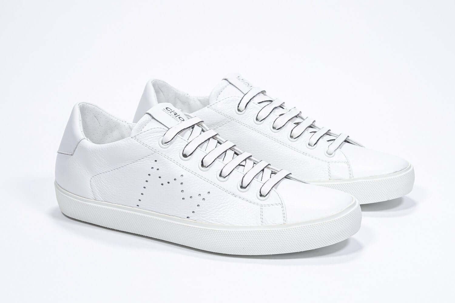 Men's Low-top PURE sneaker in White Leather showcasing smooth full-grain Italian leather craftsmanship.