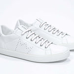 Men's Low-top PURE sneaker in White Leather showcasing smooth full-grain Italian leather craftsmanship.