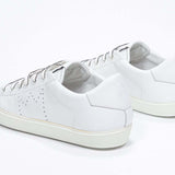 Men's Low-top PURE sneaker in White Leather showcasing sleek design and comfortable cushioning from behind.