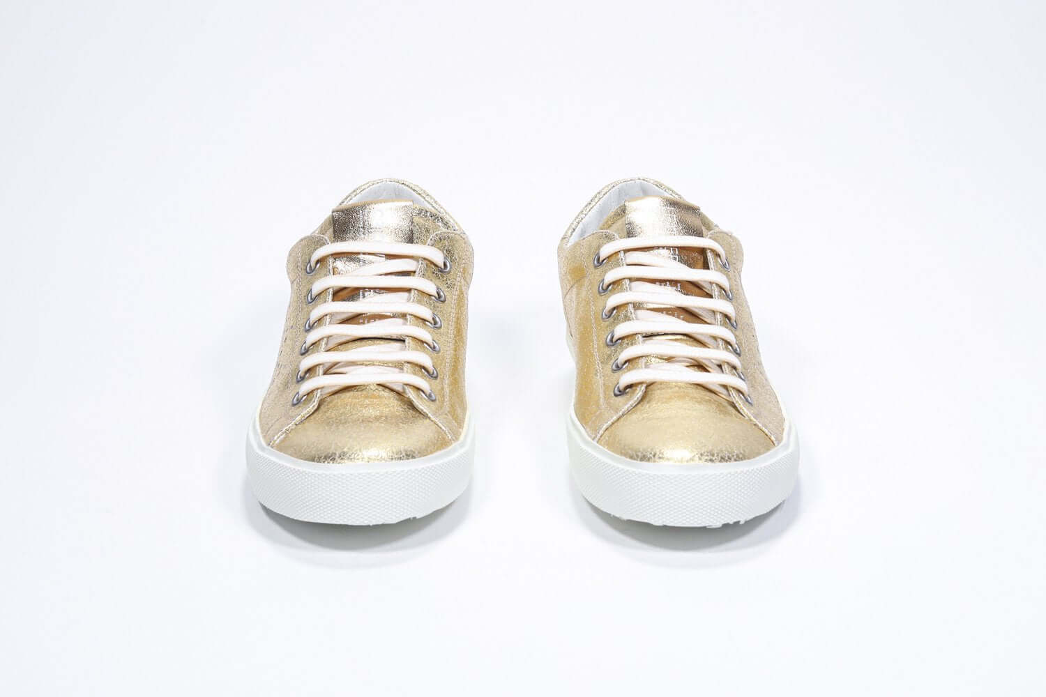 Women's Low-top PURE sneaker in Metallic Gold Leather - the perfect sneakers to elevate any outfit.