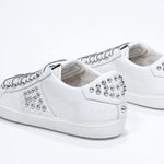  Women's Low-top STUDLIGHT in White Leather and Silver Studs sneakers, showcasing a sleek design and handcrafted details.