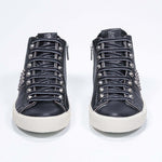 Women's STUDBORN High-top in Vintage Black Leather with polished gunmetal studs and cotton lining.